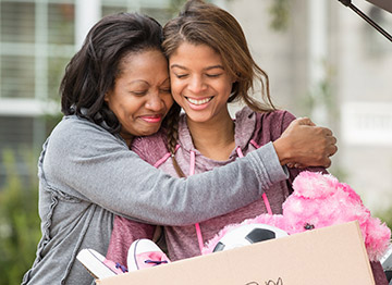 Article Image - A mother hugging her college-bound daughter. Find out what a 529 education savings account can cover. 