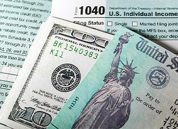 Article Image - Montage of tax forms, money, and U.S. tax return check