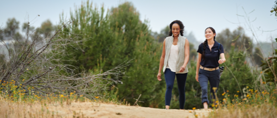 A client takes a hike with her Merrill financial advisor